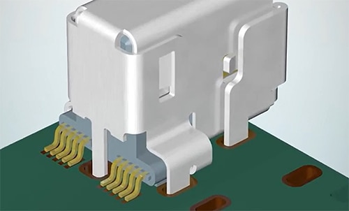 Five through-hole tabs on the socket protect the signal contacts תמונה של חמש לשוניות חור-עובר על השקע המגנות על מגעי האותות