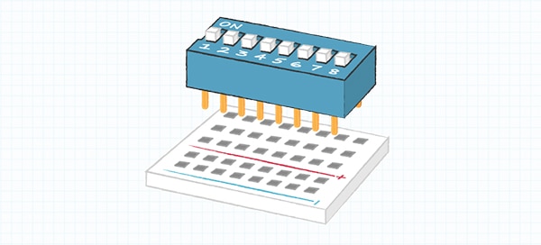 Through hole switch use on a breadboard ภาพการใช้สวิตช์รูทะลุบนบอร์ดทดลอง