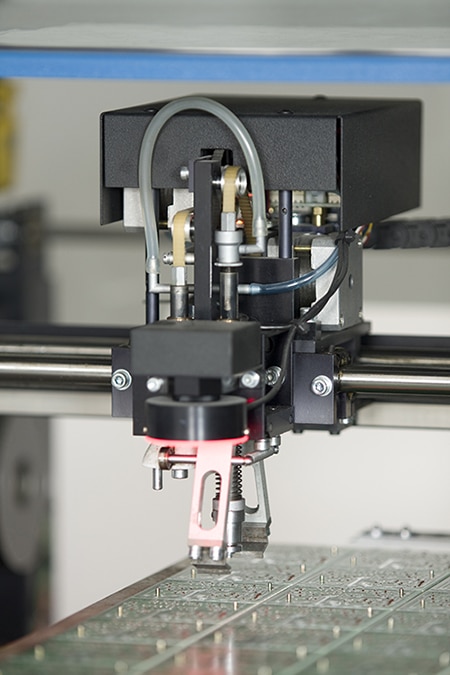 Tool heads for affixing surface-mount technology (SMT) subcomponents to a board Image of tool heads for affixing surface-mount technology (SMT) subcomponents to a board