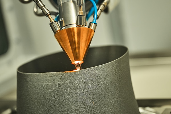AM equipment used to produce advanced metal workpieces Image of AM equipment used to produce advanced metal workpieces