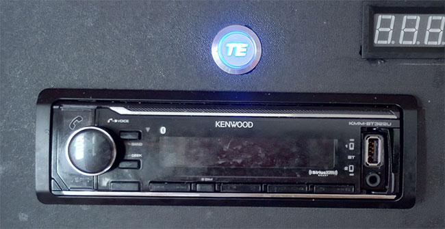 TE Connectivity anti-vandal push-button switch installed to cut power to the radio when not in use