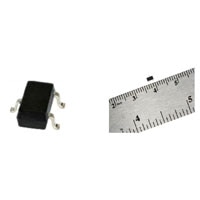 A nanopower series magnetoresistive sensor IC closeup and one with a ruler for scale Nanopower Series