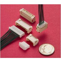 ZE series wire-to-board crimp-style connectors with dime to show scale ZE Connector