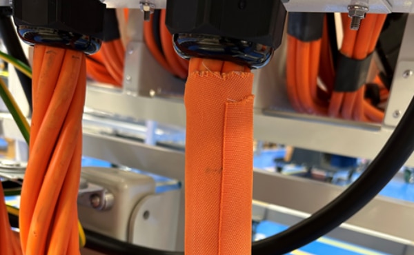 Image of Orange FITCO PROTEC Wrap Protecting HV Cables