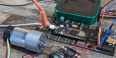 Image of the Seeed MDD3A motor driver, Polilu 4754 motor, Arduino C33 breakout board, and Digilent Analog Discovery