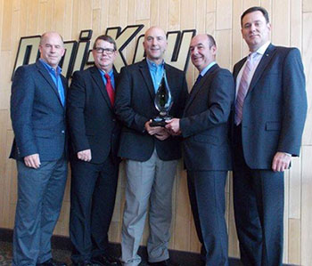 Image of Harwin presenting Digi-Key with the Global Distributor of the Year Award