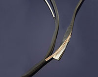 Image of Parker Chomerics' CHO-SHRINK® 1061 Electrically Conductive Heat Shrinkable Tubing