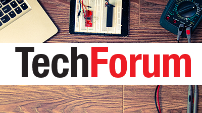 TechForum logo with laptop and electronics on table in background
