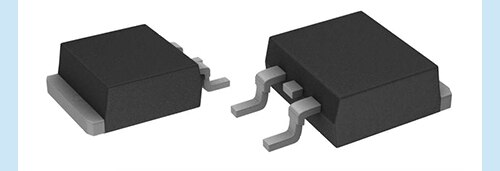 Image of small voltage suppressors with larger coins for scale