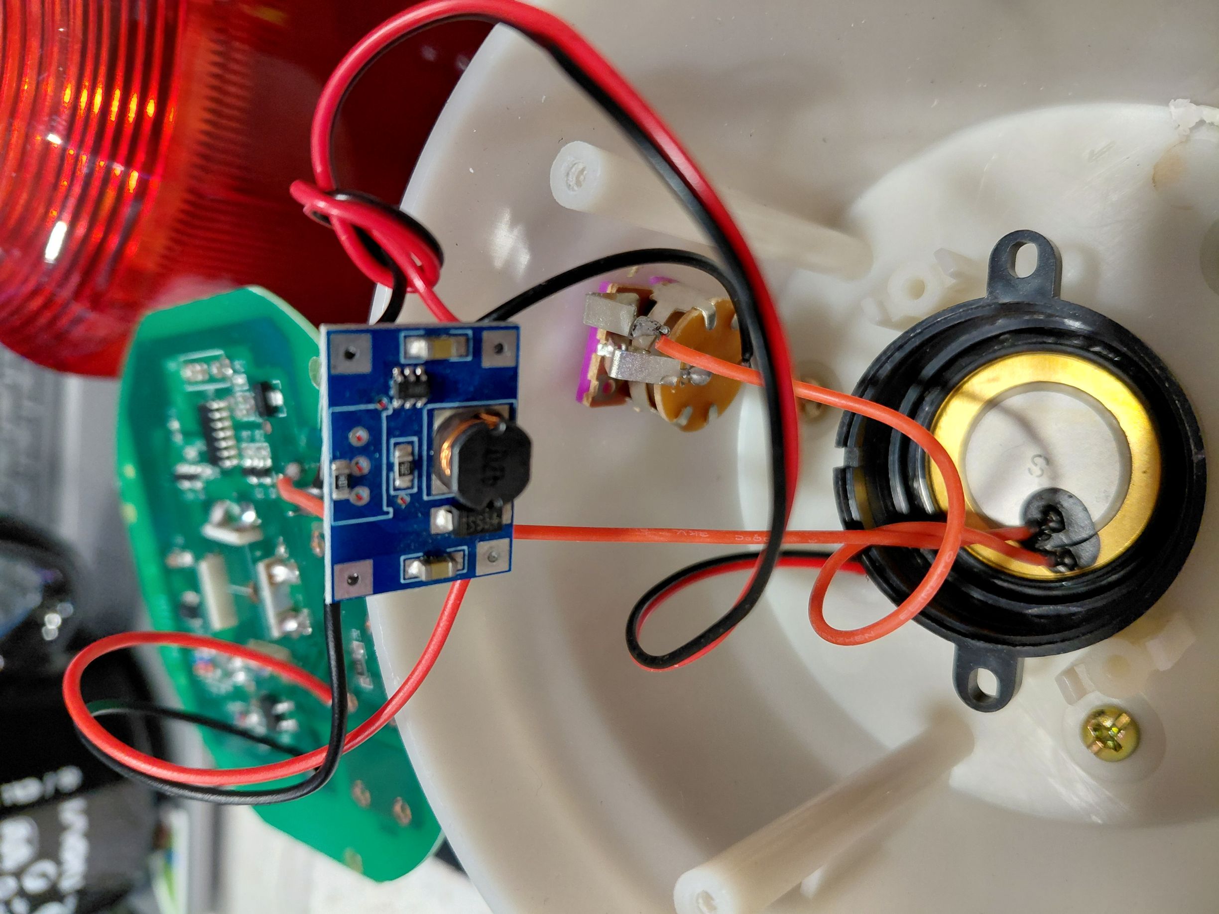 Inside base of warning light with tape removed