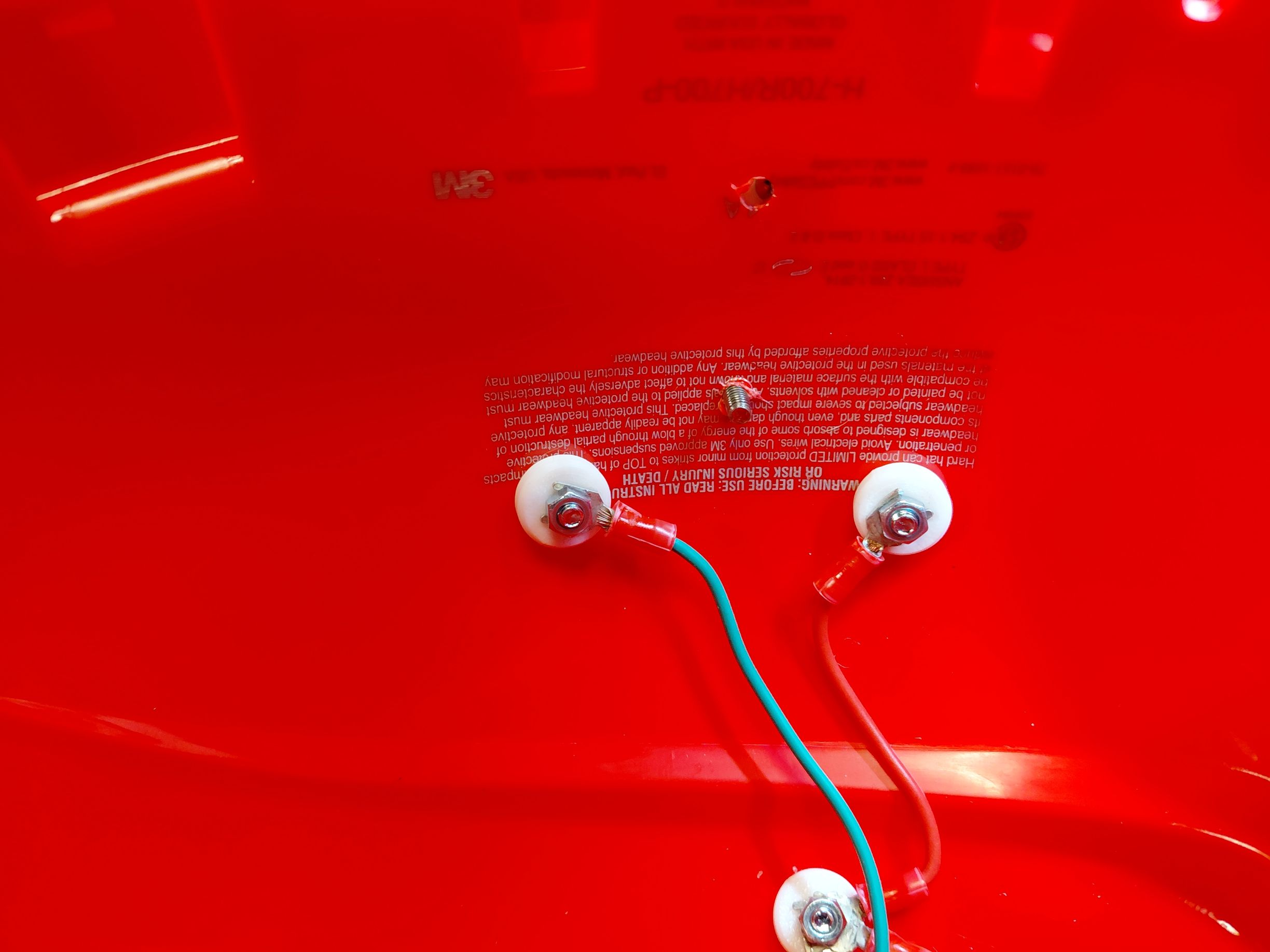 Wiring assembly inside helmet