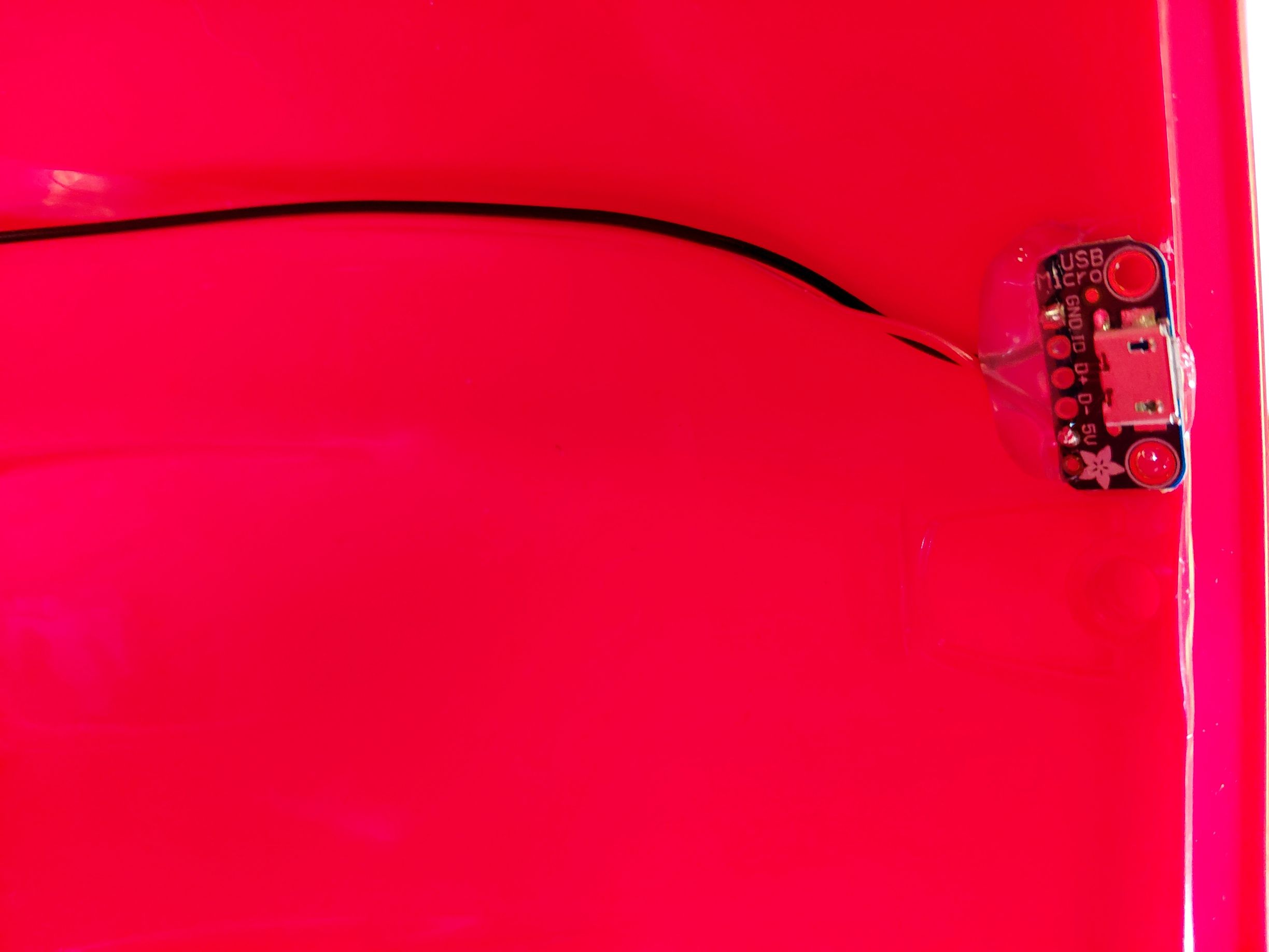 USB breakout board glued inside helmet